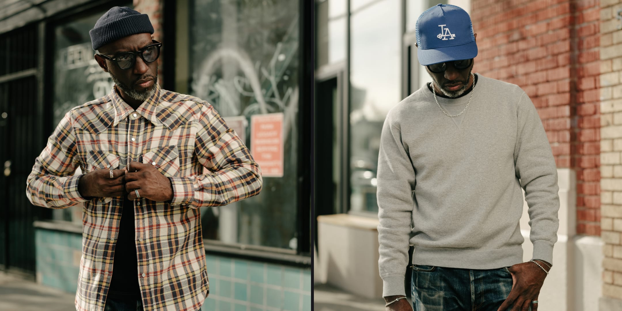 Two men walking on a street, one wearing a plaid shirt and cap, the other in a gray sweater and blue cap.