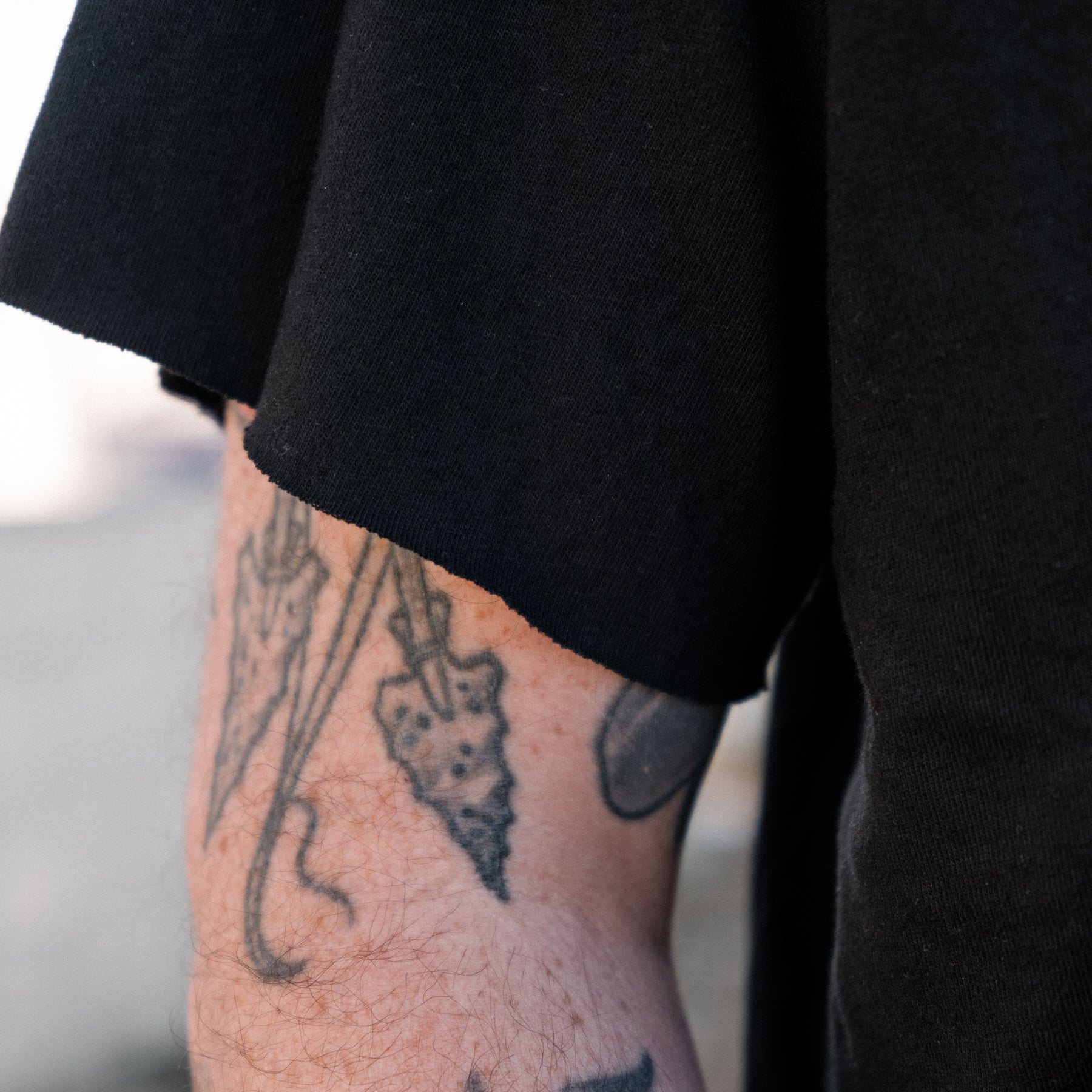 Schaeffer's Garment Hotel Cycle Varsity Drop Shoulder Raw Sleeve Tee Black