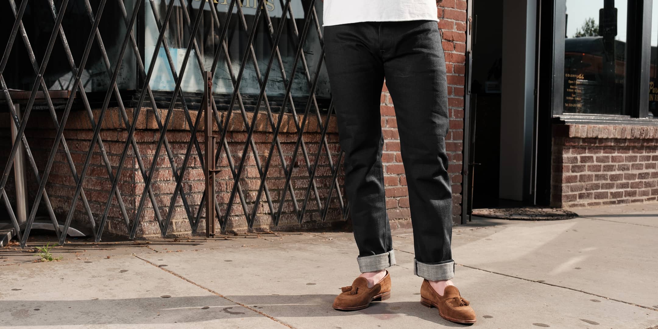 Man wearing Schaeffer's Garment Hotel "The New Paloma" 18oz 103 Tall Straight Jeans in Black