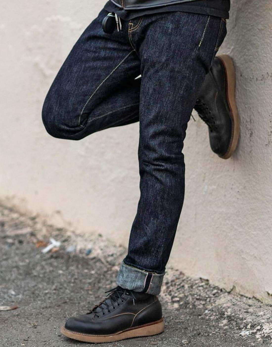Man wearing Iron Heart IH-555S-SLB 16OZ SLUBBY SELVEDGE DENIM SUPER SLIM INDIGO jeans