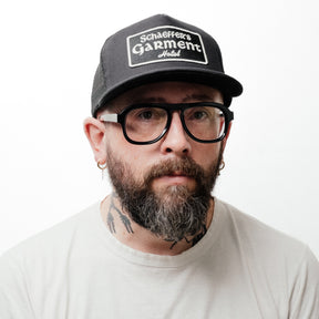 Schaeffer's Garment Hotel Chateau Trucker Hat Black