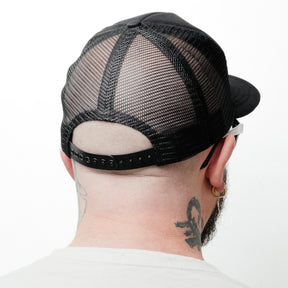 Schaeffer's Garment Hotel Chateau Trucker Hat Black