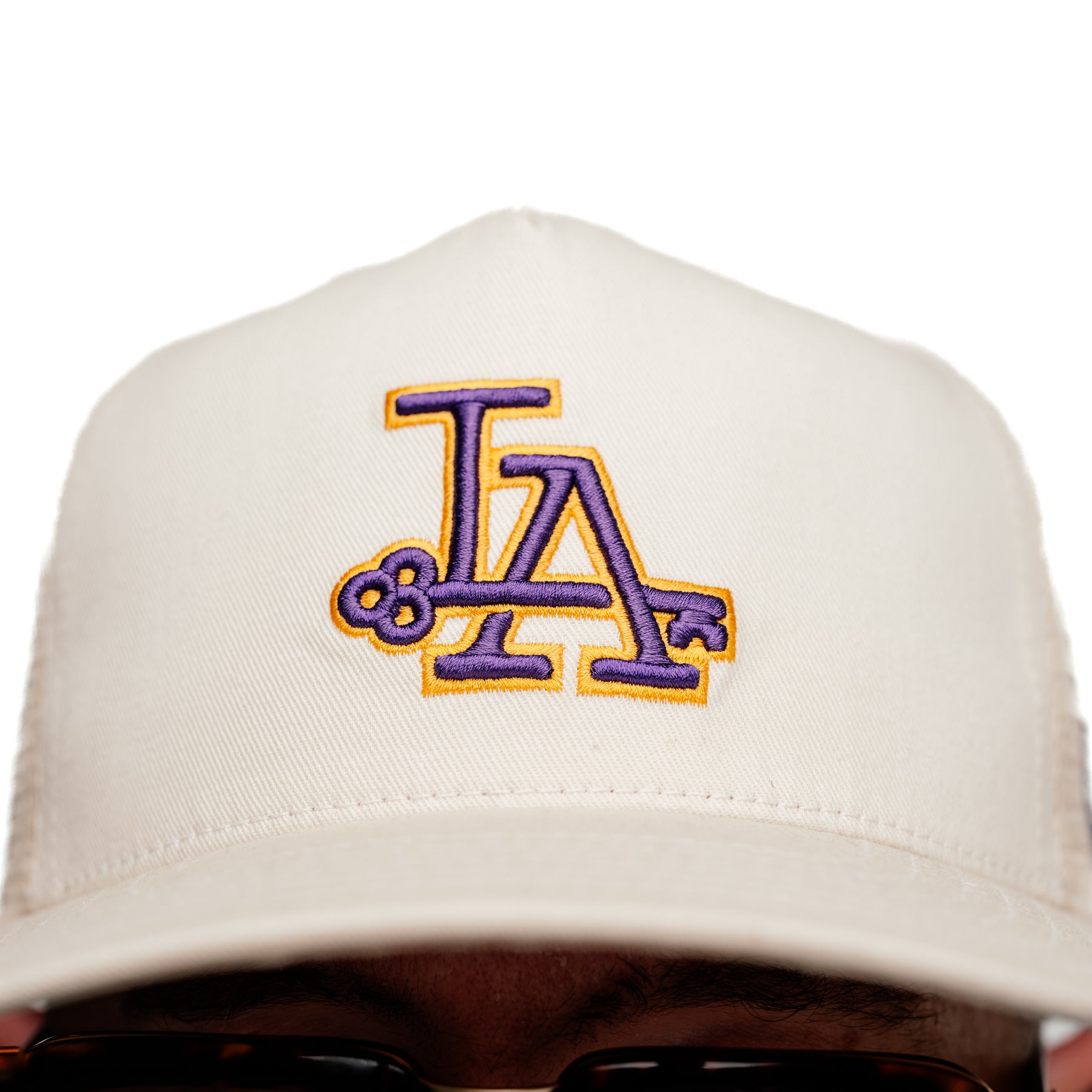 Snake Oil Provisions Key to LA Trucker Hat Lakers