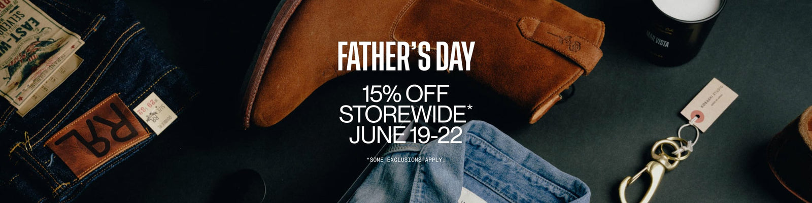 Promotional banner for Father's Day sale with jeans, wallet, and keychain on a dark background.