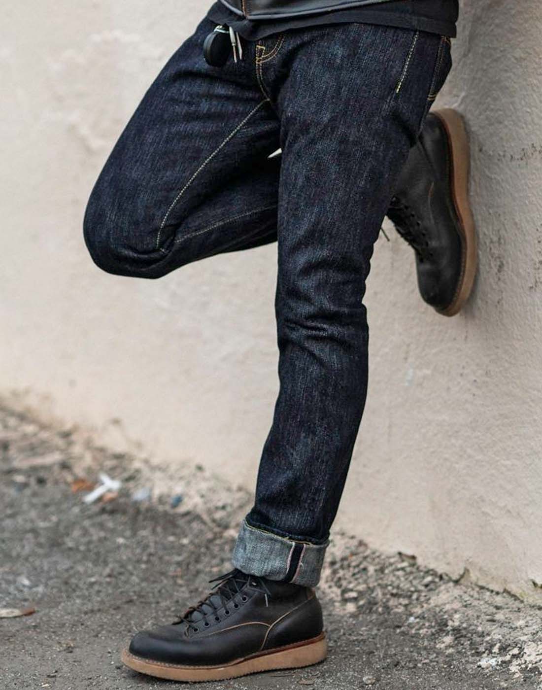 Man wearing Iron Heart IH-555S-SLB 16OZ SLUBBY SELVEDGE DENIM SUPER SLIM INDIGO jeans