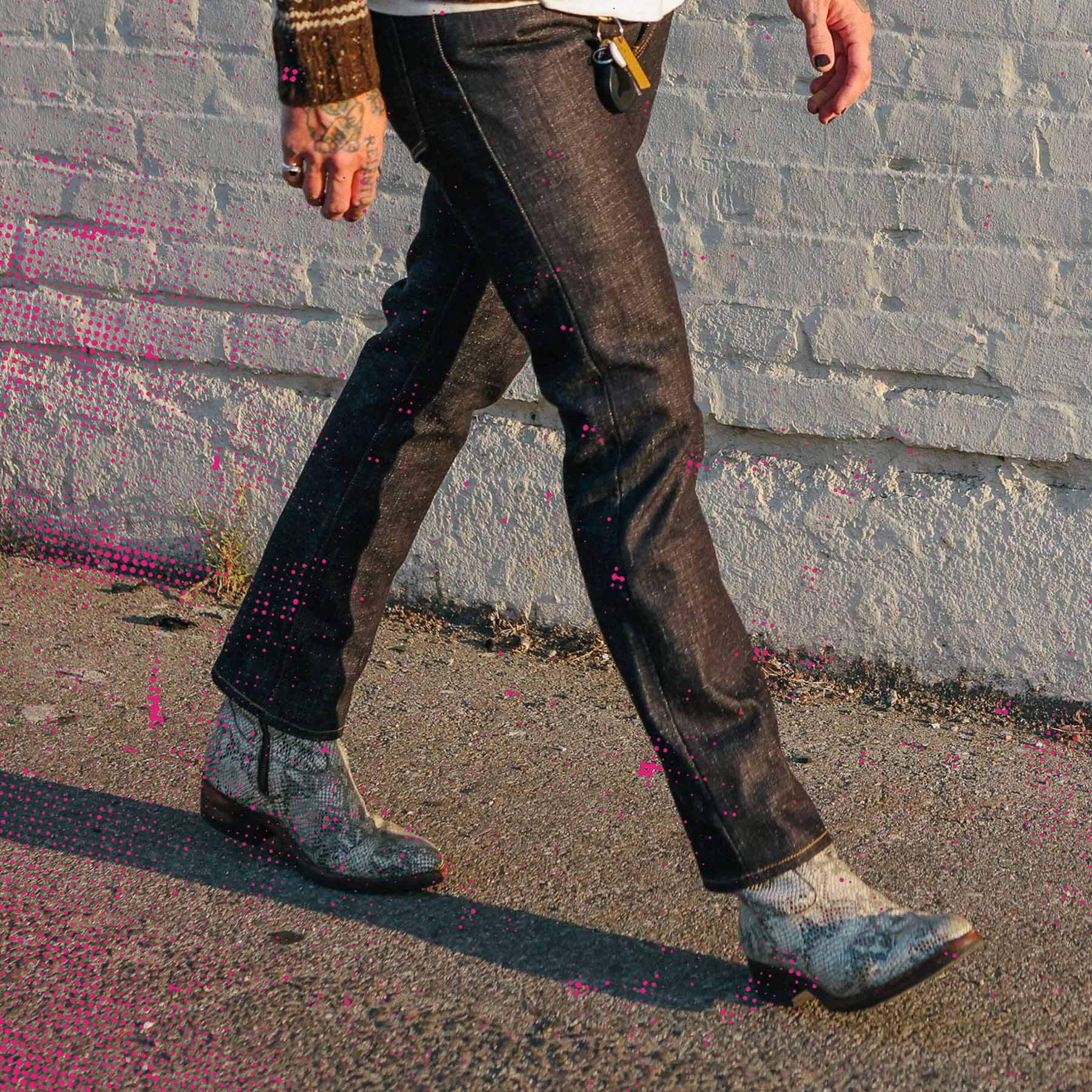 close-up of man wearing Santa Rosa x SOP Heartbreak Boots in white snakeskin