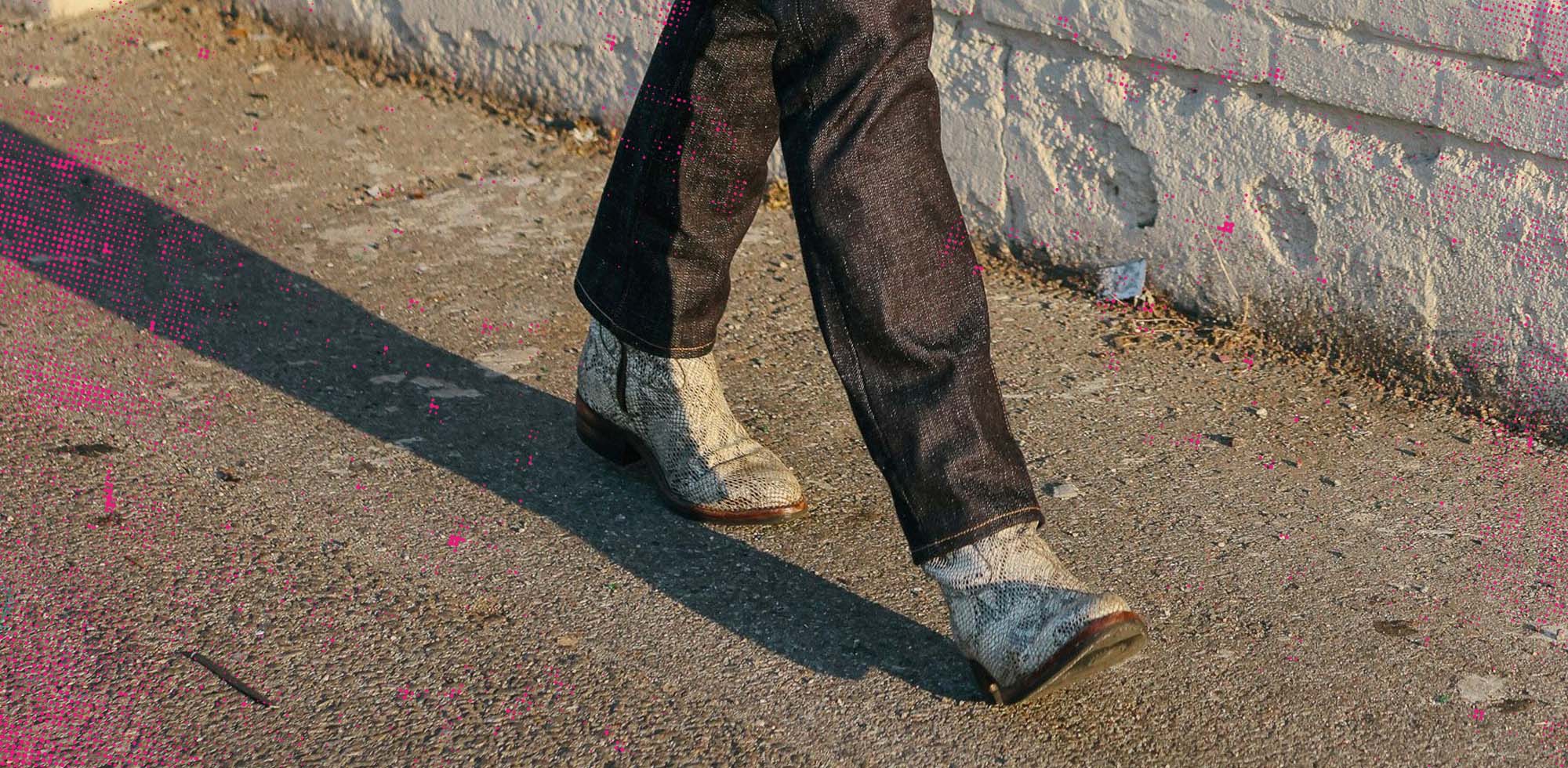close-up of man wearing Santa Rosa x SOP Heartbreak Boots in white snakeskin