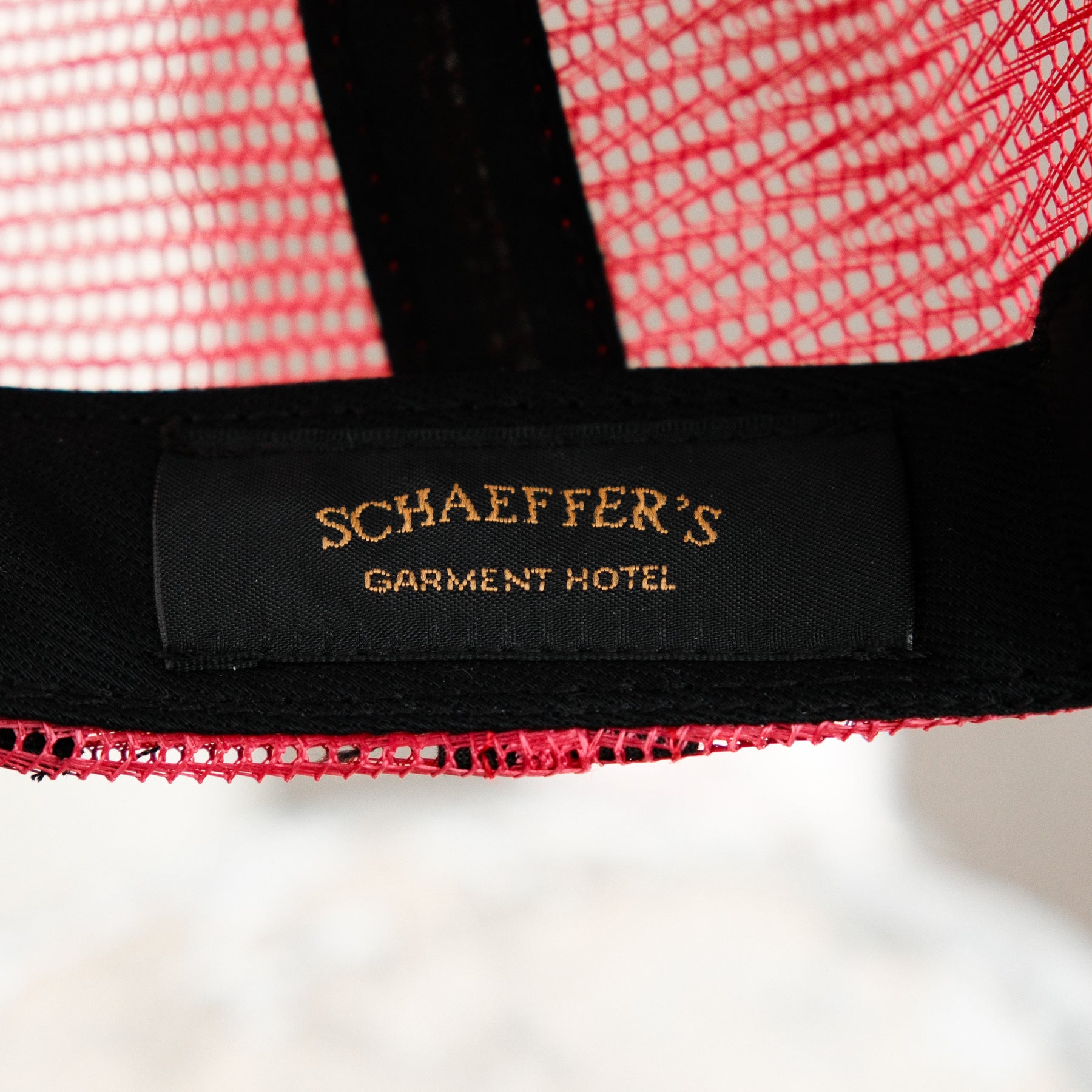 Schaeffer's Garment Hotel Trucker Hat Maroon